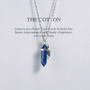 Vintage hexagonal blue crystal stone pendant necklace with silver chain on poetic card