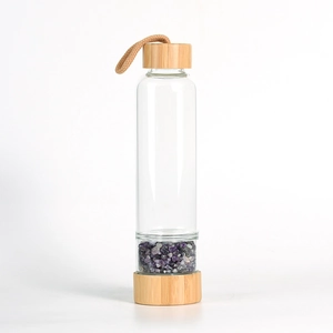 Bamboo lid glass water bottle with amethyst crystal gravel and woven carrying rope