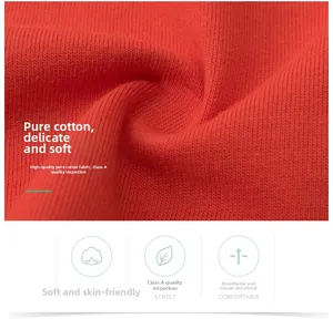 Detail of orange cotton knit fabric with Class A safety standard and ribbed texture