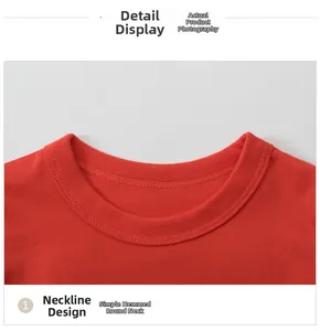 Close-up of a red cotton toddler shirt showing the ribbed crew neck and stitching