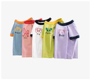 Close-up of five colorful cotton t-shirts with cartoon animal prints for children