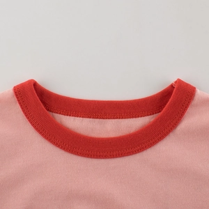 Girl's pink cotton T-shirt with red ribbed contrast collar and premium stitching