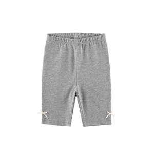 Gray cotton knit girls leggings with delicate ribbon bows on the side of the leg hem