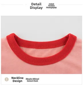 Detail of pink cotton T-shirt with contrasting red ribbed round neckline and neat stitching