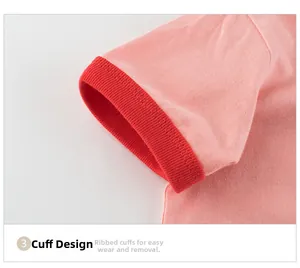 Close-up of ribbed red contrasting cuffs on a soft coral pink cotton t-shirt for girls
