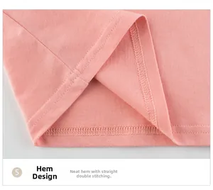 Macro shot of pink cotton T-shirt hem featuring clean double-needle stitching detail