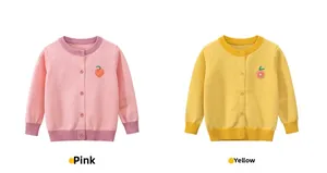Detail of children's knit cardigans featuring peach and citrus embroidery with rib cuffs