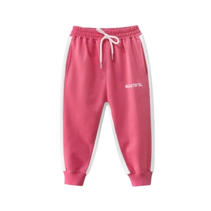 Pink girl sports pants with white side stripes and beautiful print on white background