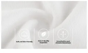 Close-up of white knitted ribbed fabric showing breathable texture and premium soft cotton