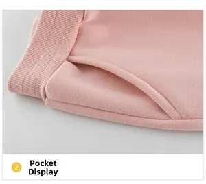 Detail of pink toddler knit joggers showing elastic waistband and side pocket