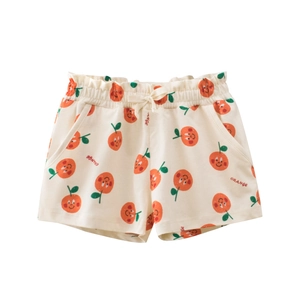 Girls summer cotton shorts with smiling orange prints and elastic ruffled waistband