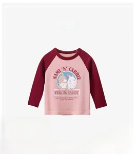 Close-up of girls' cotton long-sleeve T-shirt with sweetie rabbit print and raglan sleeves