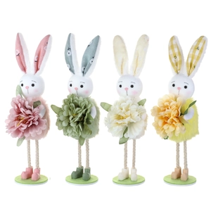 Set of four plush Easter bunny figurines holding colorful large faux flowers for home decor
