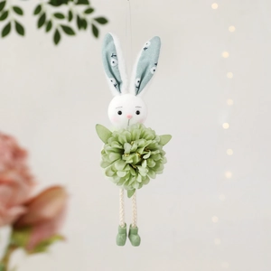 Hanging Easter bunny doll with floral petal body and rustic forest-inspired design