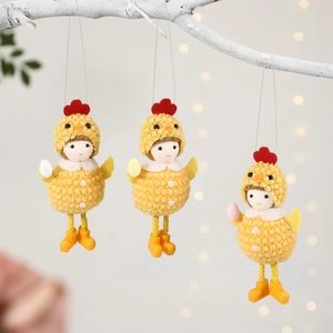 Three Easter plush doll pendants with chick hats holding colorful eggs on branches