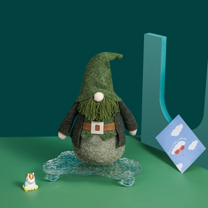 Green hat gnome doll for St. Patrick's Day with felt texture and green yarn beard