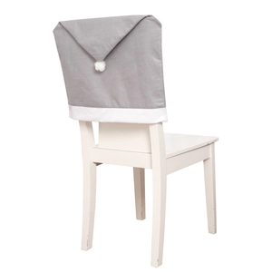 Detail of grey non-woven Christmas chair cover with white pom-pom and hat design