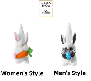 Detail of male and female Easter gnomes holding carrot and blue spotted egg props