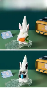 Detailed view of plush Easter gnomes featuring bunny ears holding carrots and colorful eggs
