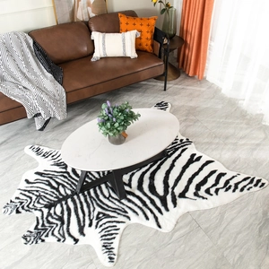 Detail of high-density faux zebra fur rug with a soft texture in a modern living room decor
