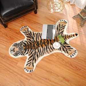Faux tiger skin area rug with animal print on wooden floor in modern living room