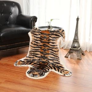 Faux tiger skin area rug with realistic animal print on warm wooden floor