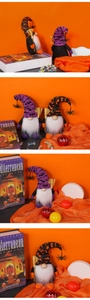 Detail of Halloween gnome dolls with bat hats, white beards, and mini brooms on orange decor
