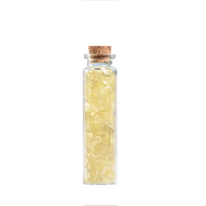 Natural yellow crystal stone chips in a glass wish bottle with cork stopper home decor