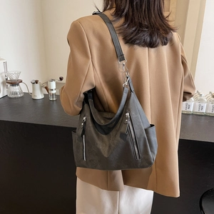 Retro charcoal grey matte leather tote bag with side zippers for daily commuting style