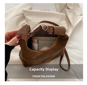 Top view of brown PU leather bag interior showing large capacity for essentials