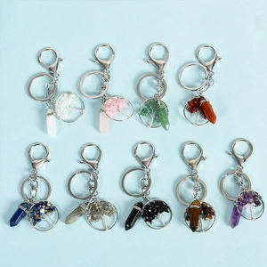 Nine natural crystal tree of life keychains set featuring various hexagonal gemstones