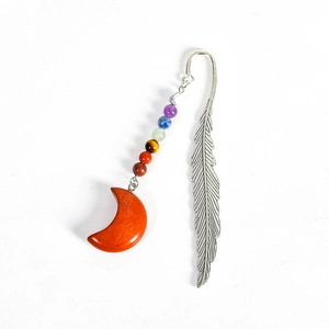 Silver metal feather bookmark with seven chakra crystal beads and red moon stone pendant