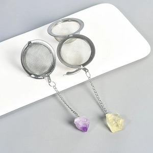 Stainless steel mesh tea infuser featuring natural crystal stone pendant and long chain