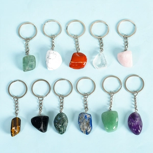 Polished natural crystal stone keychains in diverse gems including amethyst and tiger eye