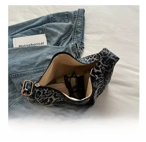 Spacious interior of leopard print canvas tote bag showing daily storage capacity