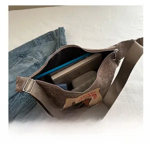 Interior view of large corduroy tote bag showing spacious storage and bear embroidery