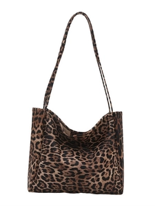 Large leopard print canvas tote bag with slim shoulder straps for versatile daily commute