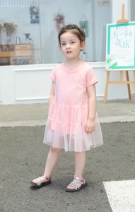 Pink short sleeve tutu dress for toddler girls featuring a layered tulle skirt and knit top