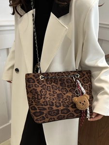 Chic leopard print tote bag with metal chain strap and cute bear charm for women