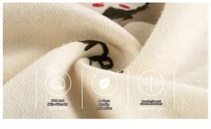 Close-up of soft Class A cotton fabric with cartoon print for toddler sweatshirts