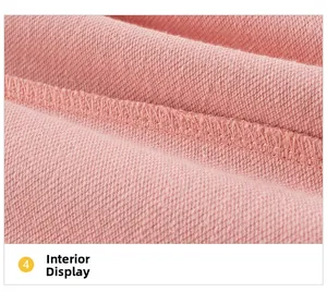 Close-up of pink knit hoodie fabric showing internal texture and overlock stitch detail