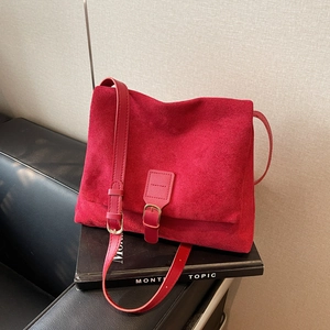Retro deep red suede messenger bag with gold buckle and adjustable leather strap