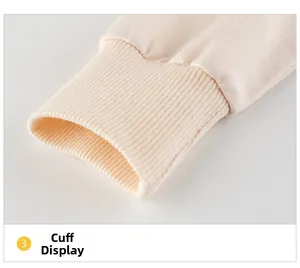 Close-up of ribbed cuffs on long-sleeve cotton top for girls with quality stitching