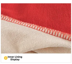 Macro detail of red knitted fabric showing soft cream-colored terry lining and stitching