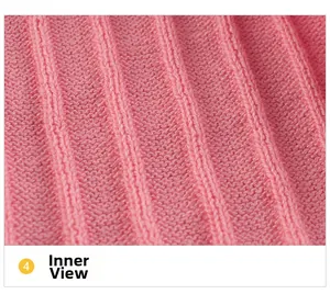 Macro shot of pink ribbed knit sweater interior fabric detailing the soft texture