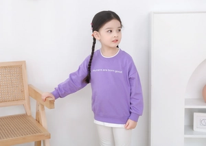 Detail of lavender girls sweatshirt with ribbed cuffs and white slogan print