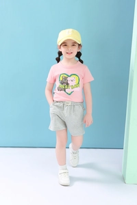 Detailed studio shot of a pink girls' T-shirt with twin bears and grey casual shorts