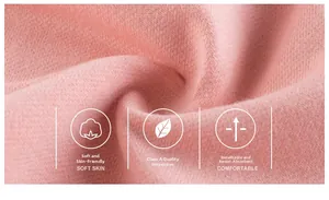 Macro shot of soft pink breathable cotton fabric showing fine knit texture and A-grade quality