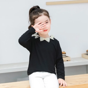 T-shirt a maniche lunghe in cotone nero per bambine con fiocchi decorativi in tulle
