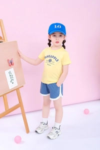 Kids summer set with yellow pineapple printed t-shirt and blue sporty casual shorts
